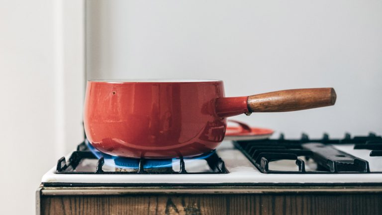 red pot gas stove tall