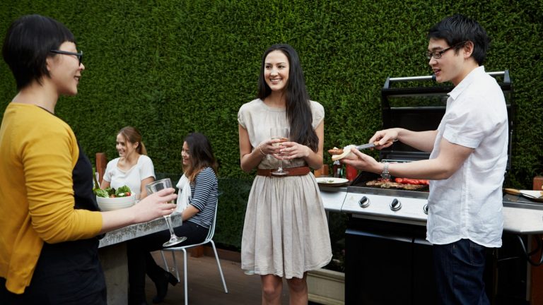 family-and-friends-using-bbq-gas