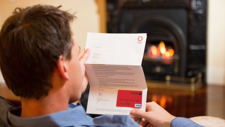 customer-reading-a-letter-from-Origin