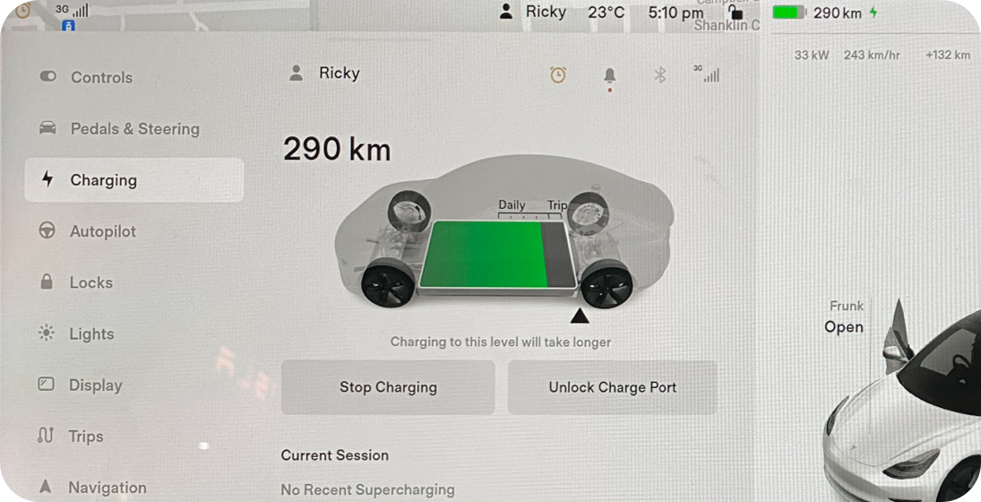 Console screen in a Tesla displaying vehicle charging information.